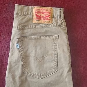 Levi's 512, Fit: slim taper, size W32 L30, tan color.